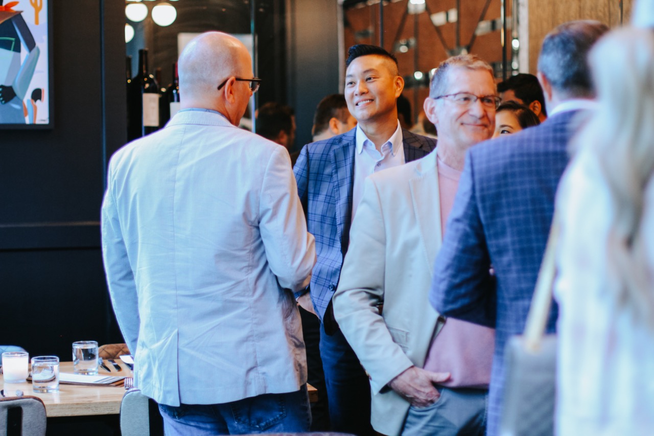 Men networking at event